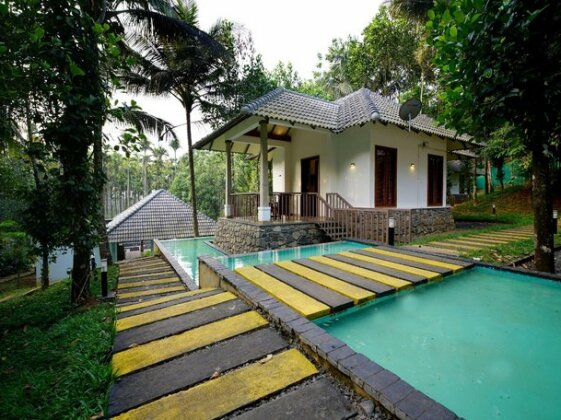 OYO 10233 Century Village Resort - Photo4