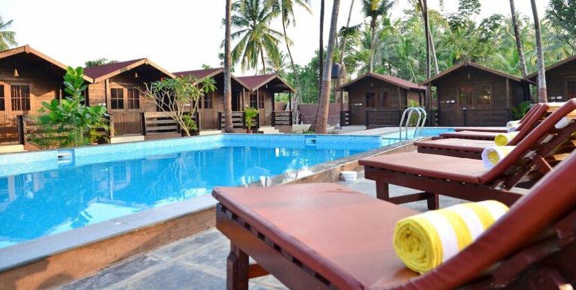 Capital O 8058 Map5 Village Resort - Photo2