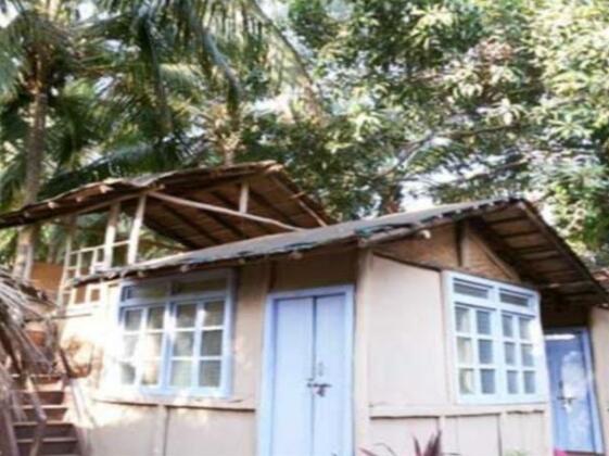 Tulsi Huts and Cottages - Photo4