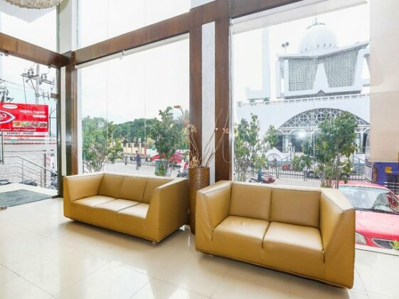 Green Wood Inn & Suites - Photo2