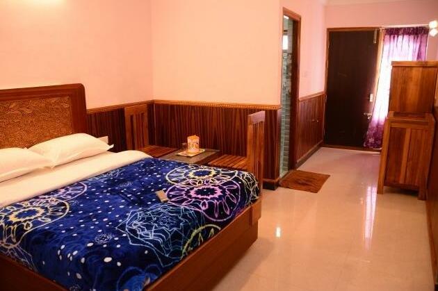 Hotel Rainforest Ooty - Photo2