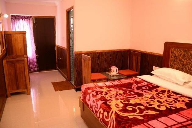 Hotel Rainforest Ooty - Photo5