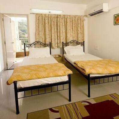 Palm Leaf Serviced Apartments - Model colony
