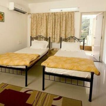 Palm Leaf Serviced Apartments - Model colony