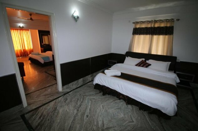 Sai Palace Inn Puttaparthi - Photo3