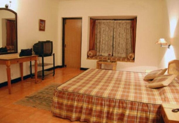 Woodsvilla Resort - Photo5