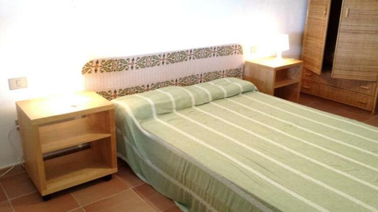 Cala Lunga Holiday Home - Photo3