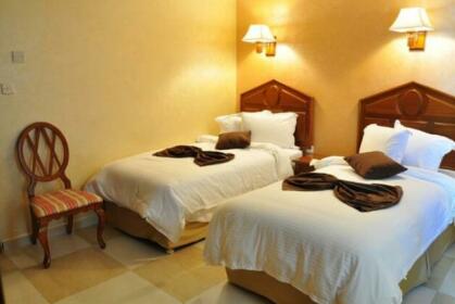 Rest Inn Hotel Suites
