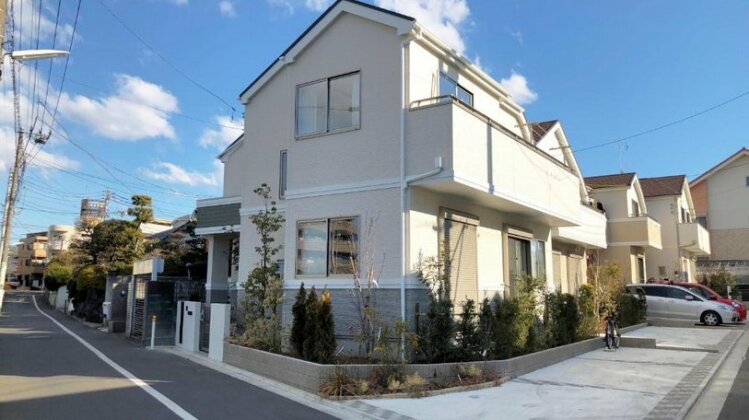 Family House in Tokyo Tamagawa