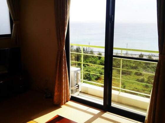 Kariyushi Condominium Ocean Hills Chouraku Stay - Photo5