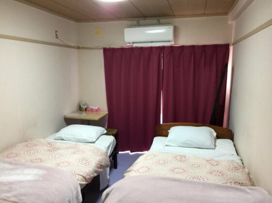 Backpackers Dorms Miwa Apartment