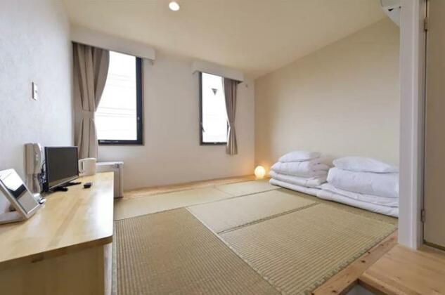 Onna Japanese Style Hotel Hokkaisou - Photo2