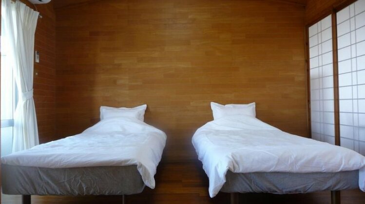 Pension Crystal Inn Onna - Photo2
