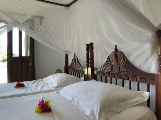 Karibuni Hotel & Villas - Photo4