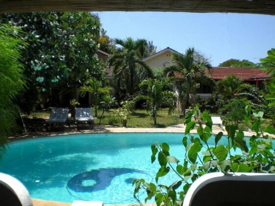 Frangipani Cottages - Photo2