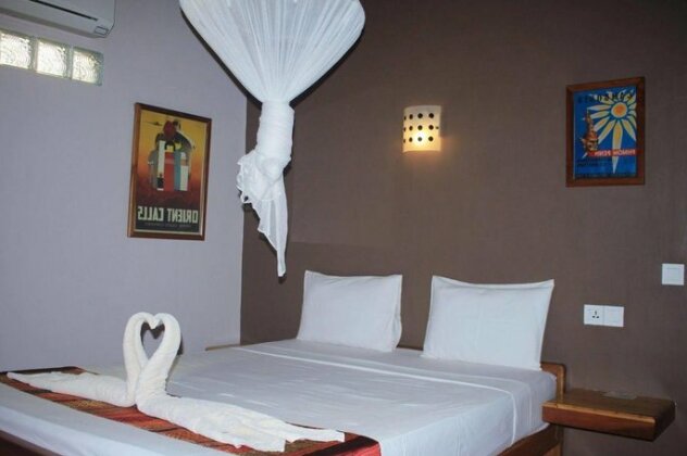 Botanica Guesthouse - Photo5