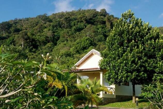 Q Bungalows - Photo5