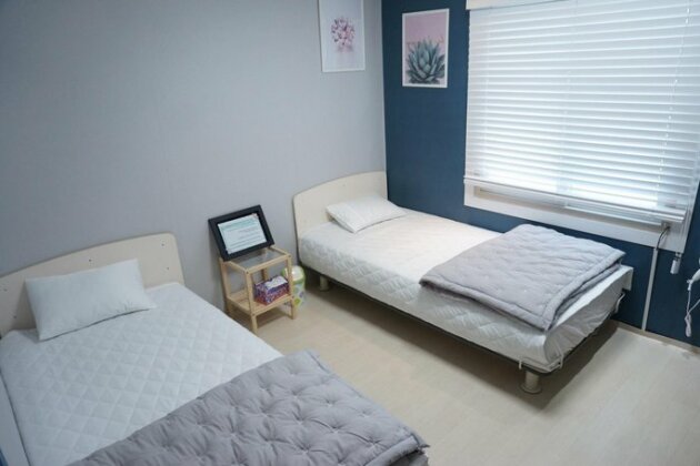 AIRPORT Guesthouse Busan - Photo2