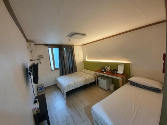 K Guesthouse - Photo2
