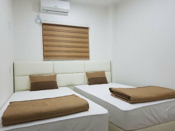 The Comma Guest House - Photo2