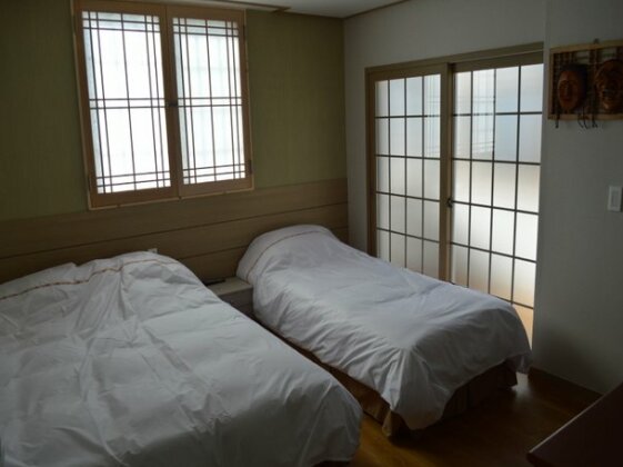 Nihao Guesthouse - Photo2