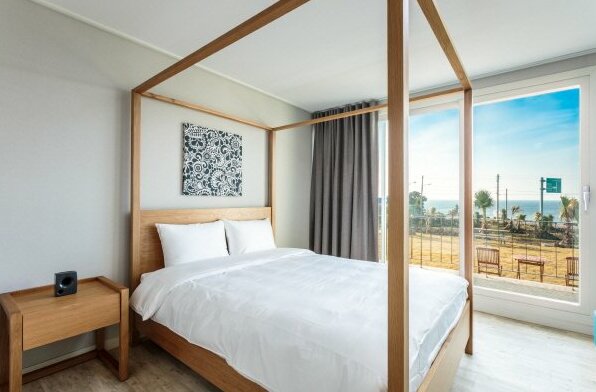 Roomat155 Pension Jeju - Photo4
