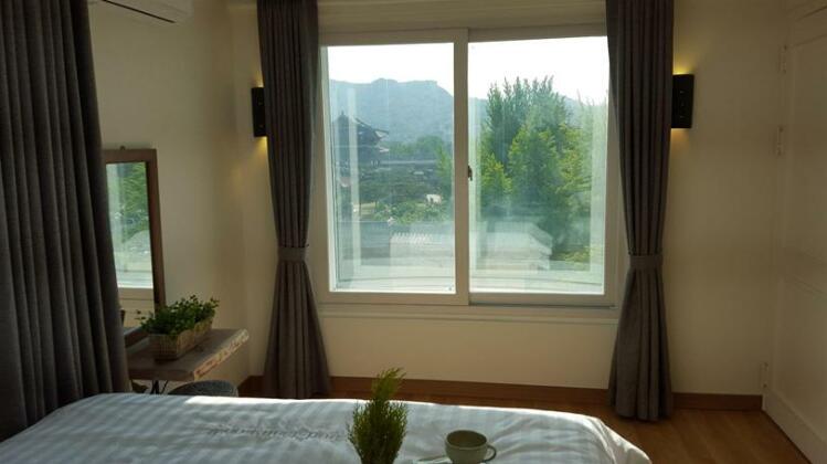 Woo Guesthouse - Photo5