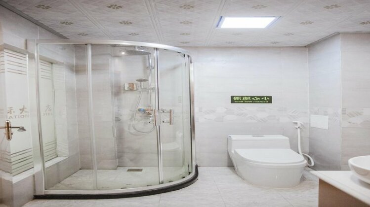 He Tian Hotel - Photo5
