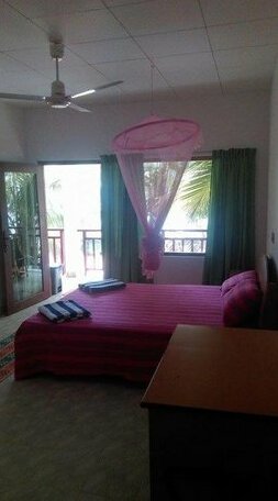 Coconut Palm Guesthouse - Photo4