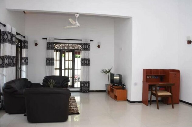 Ashen's Beach House - Photo4