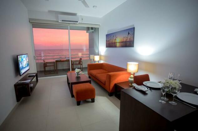 The Beach - All Suite Hotel - Photo2