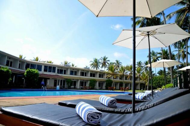 Palm Village Hotel - Photo2