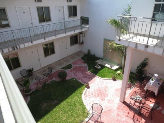 Hotel & Suites La Huerta - Photo2