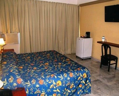 Parque Inn Hotel & Suites - Photo2