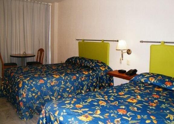 Parque Inn Hotel & Suites - Photo3