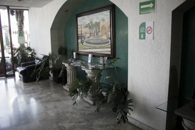 Estanza Hotel & Suites - Photo3