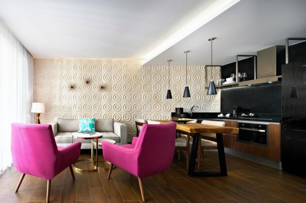 The Fives Downtown Hotel & Residences Curio Collection by Hilton - Photo3