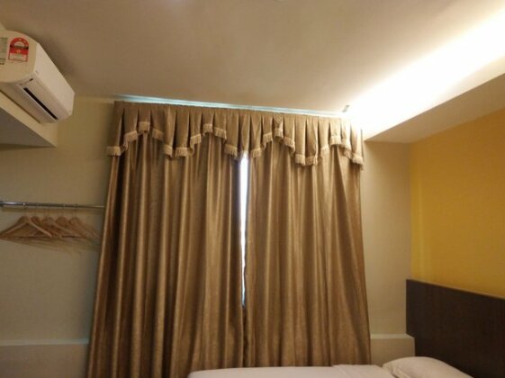 Check Inn KK - Photo2