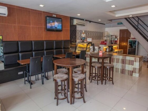 OYO 209 Yomi Hotel - Photo4