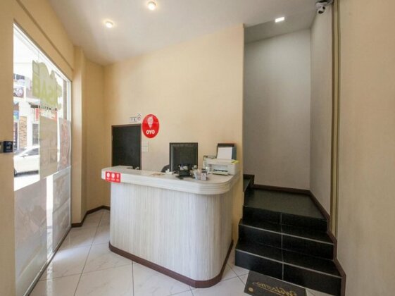 OYO 228 Basic Hotel - Photo5