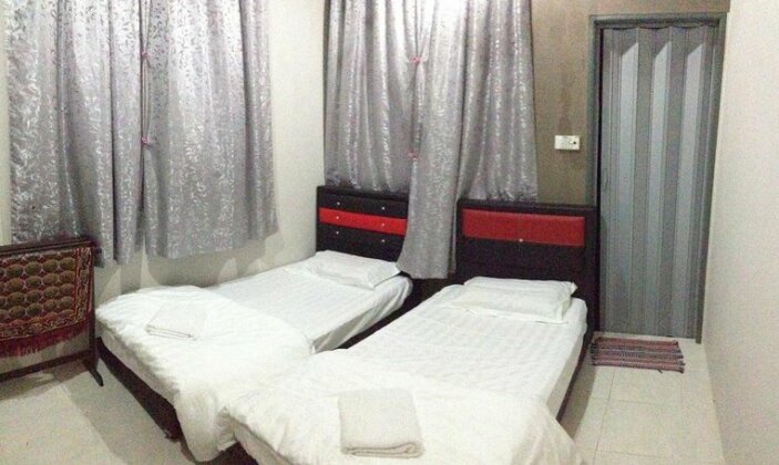 Anggun Beach Guest House - Photo5