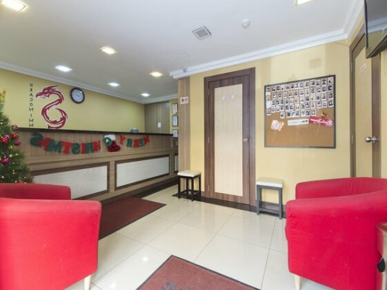 OYO 615 Dragon Inn Premium Hotel - Photo4