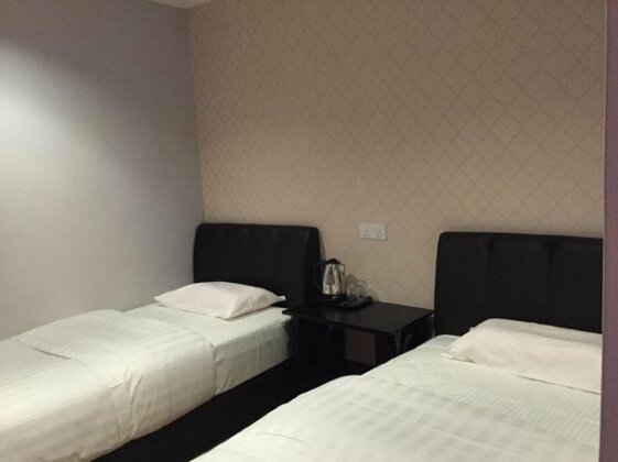 Tas Sakura Budget Hotel - Photo5