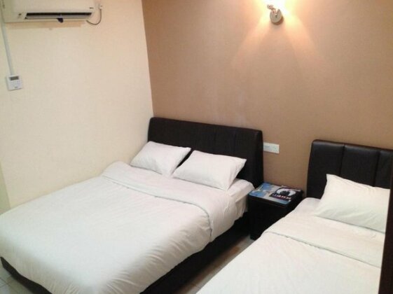 ZEN Rooms Golden Star - Photo4