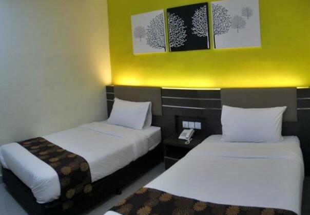 GM Holiday Hotel - Photo4