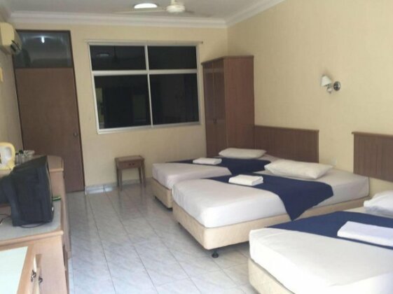 Teluk Batik Holiday Apartment - Photo5