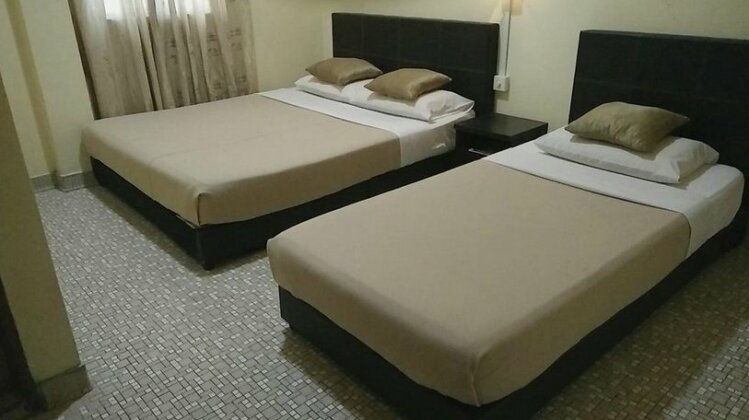 OYO 703 MyRA Hotel - Photo4