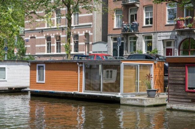Cozy houseboat in a quiet canal