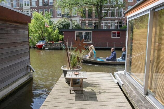 Cozy houseboat in a quiet canal - Photo4