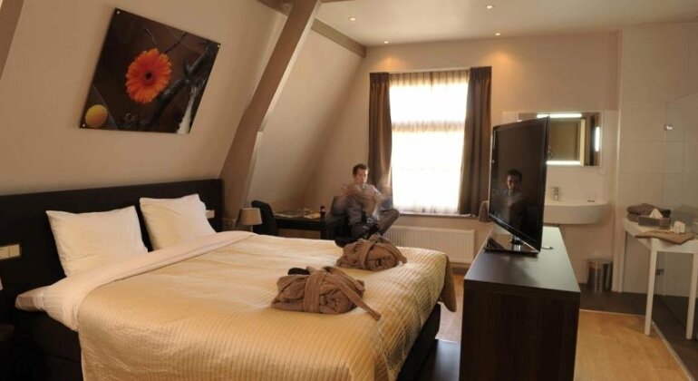 Brasss Hotel Suites - Photo4